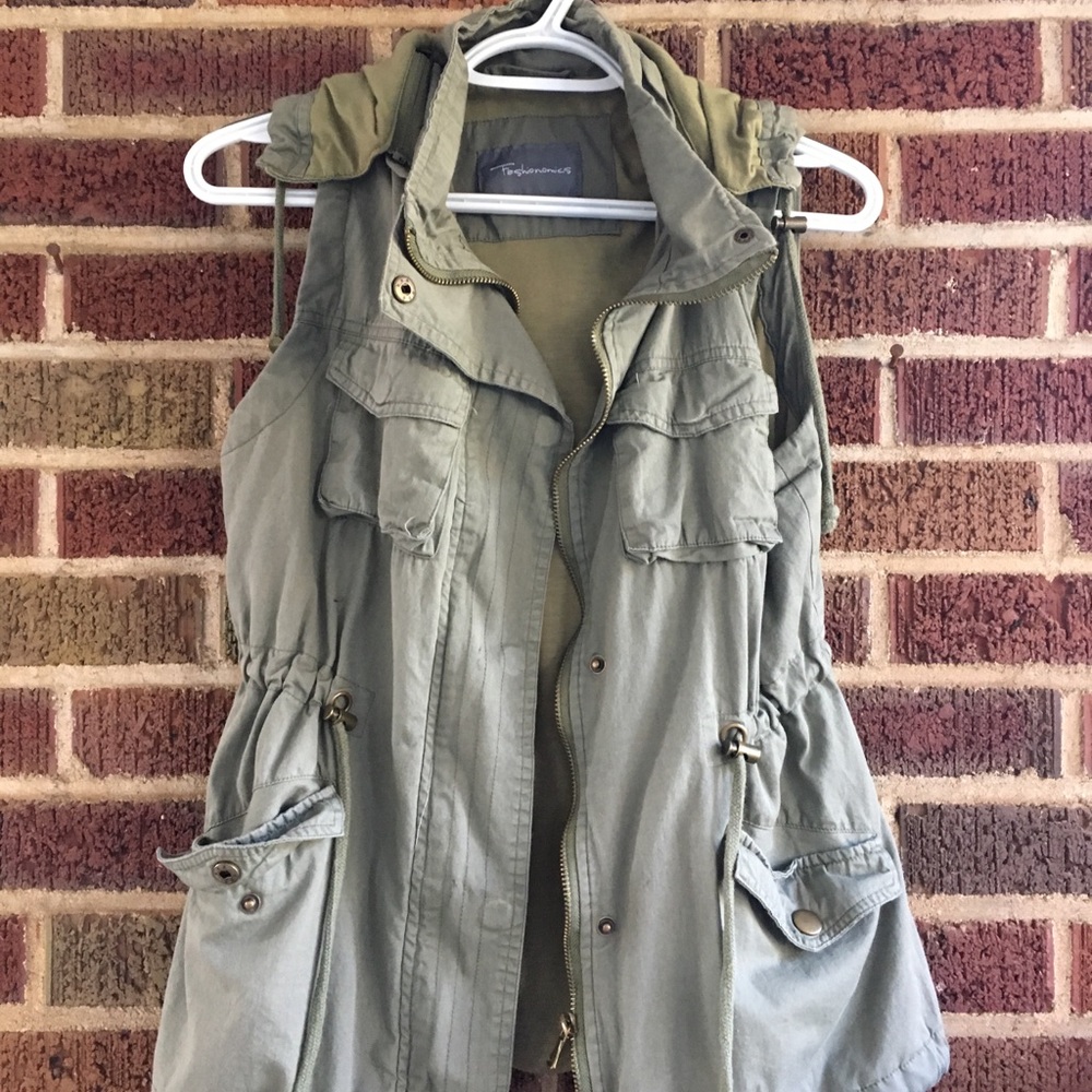 Gently used green utility vest.